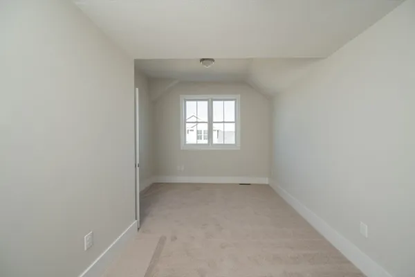 an empty room that has a window