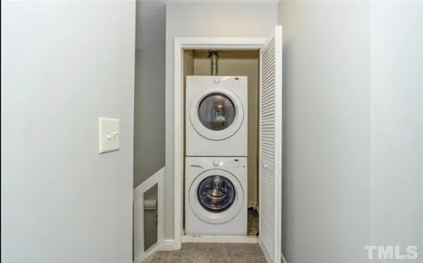 a view of washer and dryer in a utility room