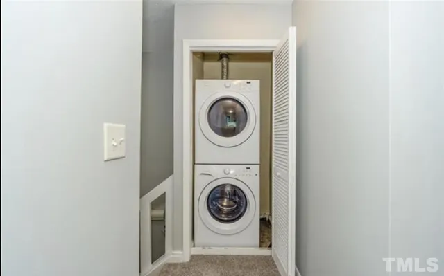 a view of washer and dryer in a utility room