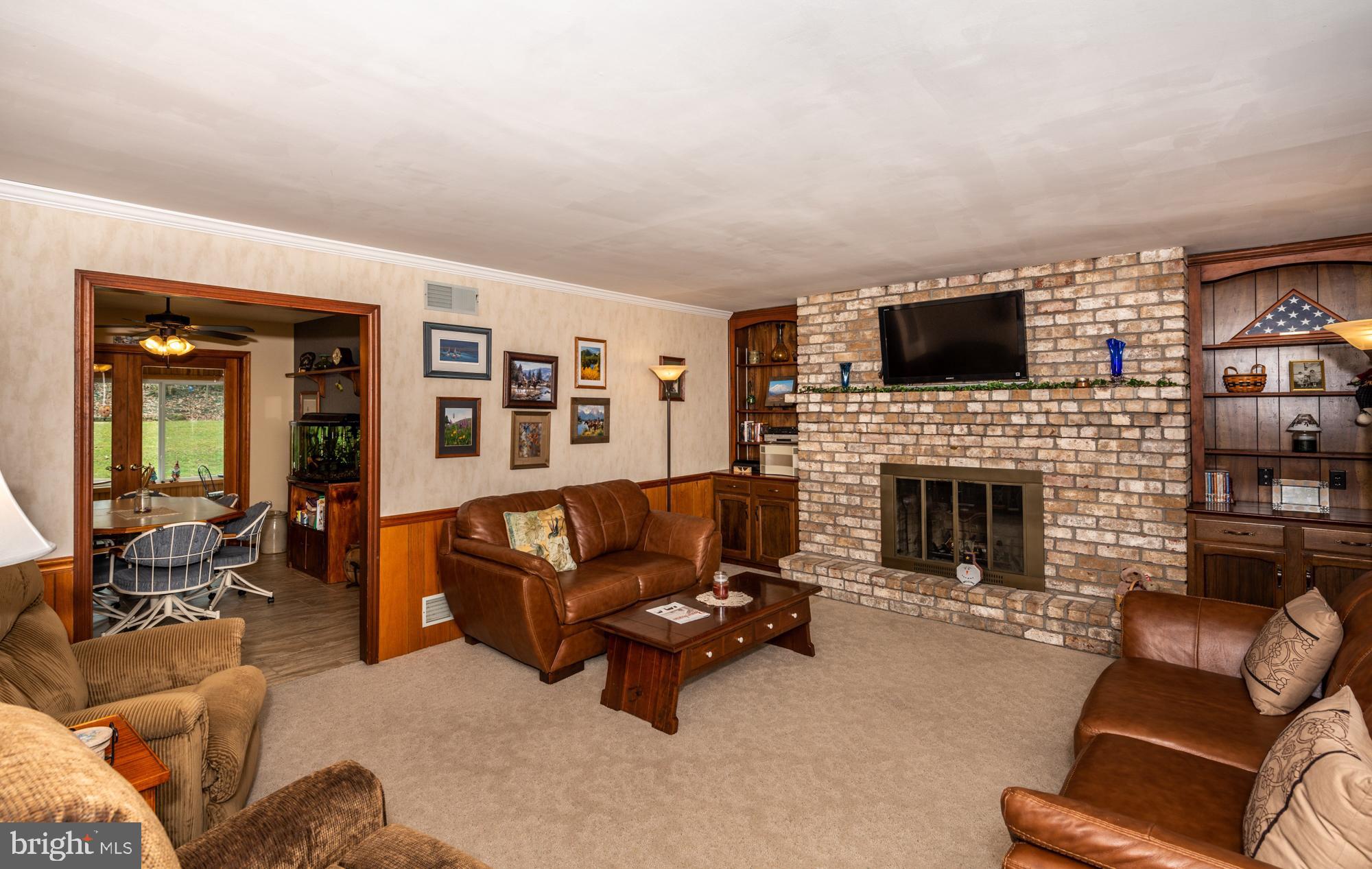 210 Bomberger Road Akron, PA 17501 - Photo 14 of 40 1st Floor Family Room with FP