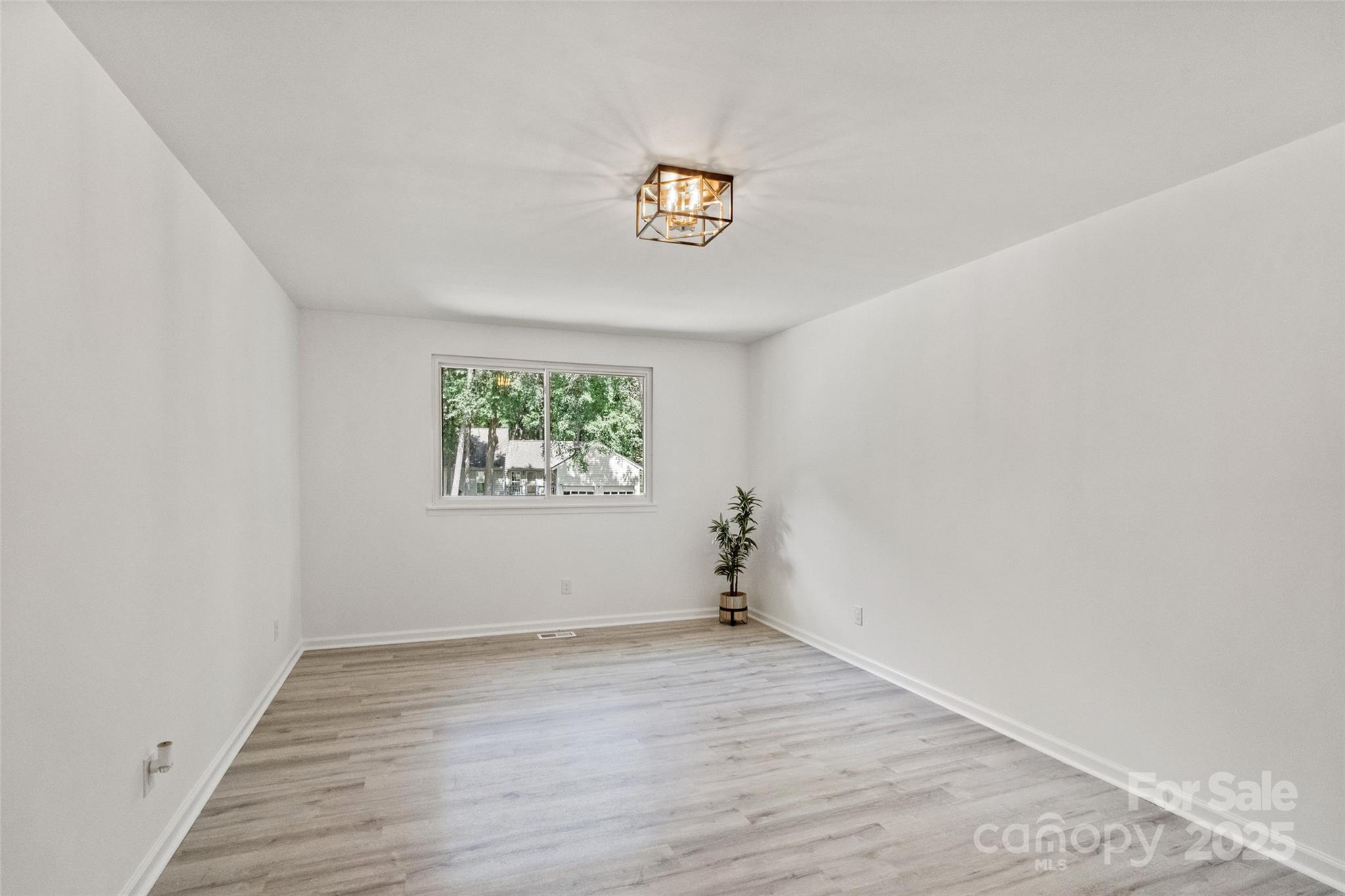9514 Fairway Ridge Road Charlotte, NC 28277 - Photo 18 of 36 an empty room with a window