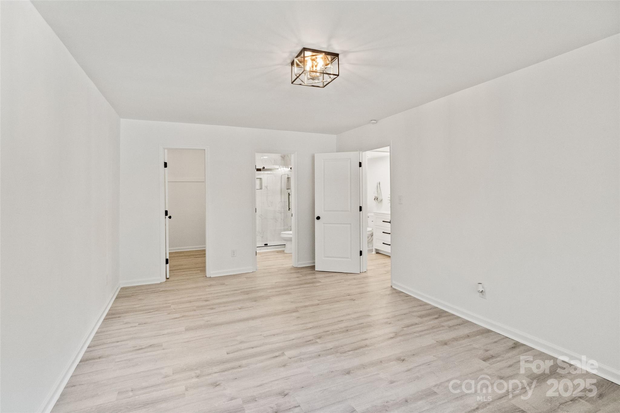 9514 Fairway Ridge Road Charlotte, NC 28277 - Photo 19 of 36 a view of an empty room with wooden floor