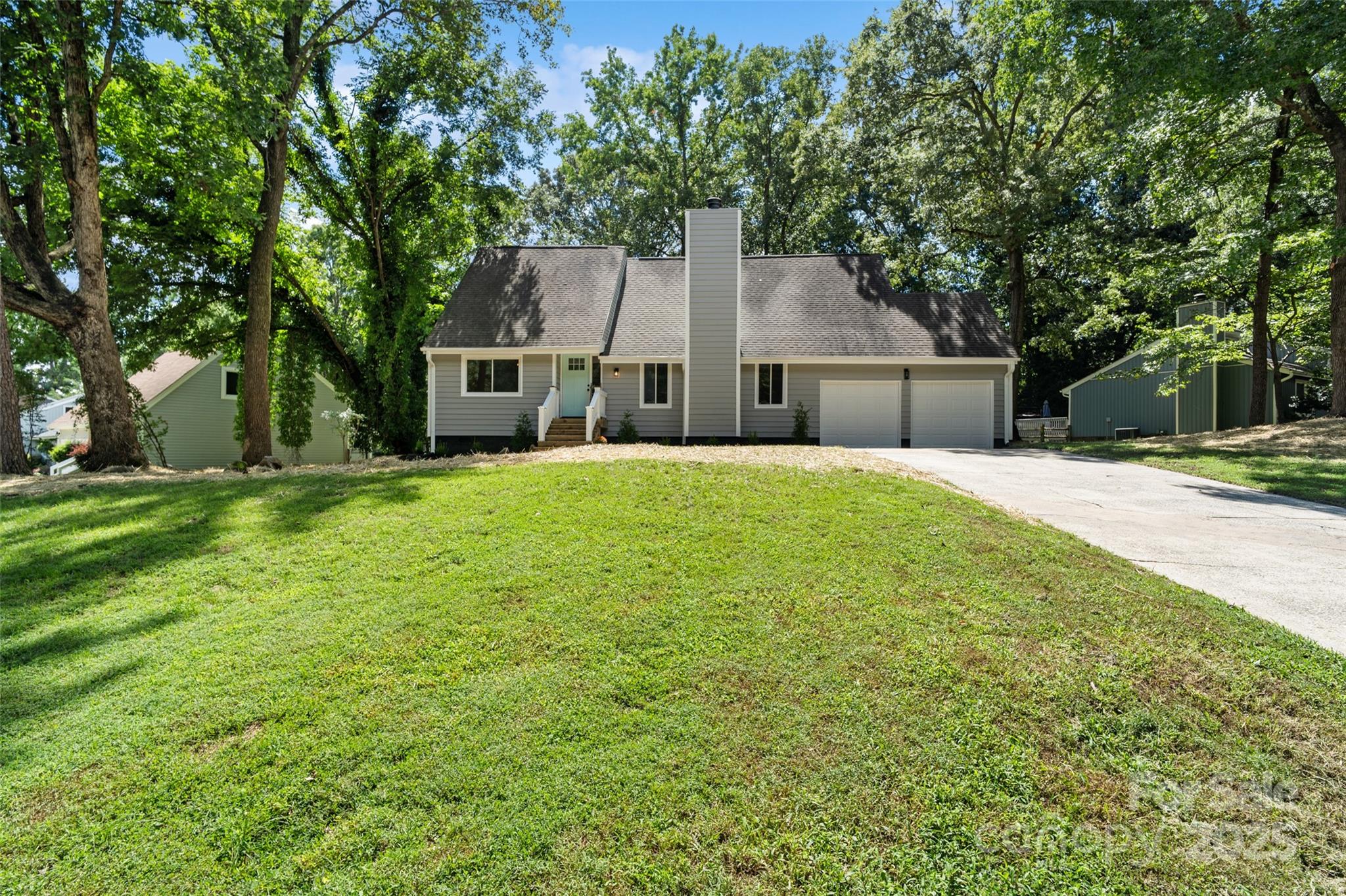 9514 Fairway Ridge Road Charlotte, NC 28277 - Photo 2 of 36 a front view of house with yard and trees