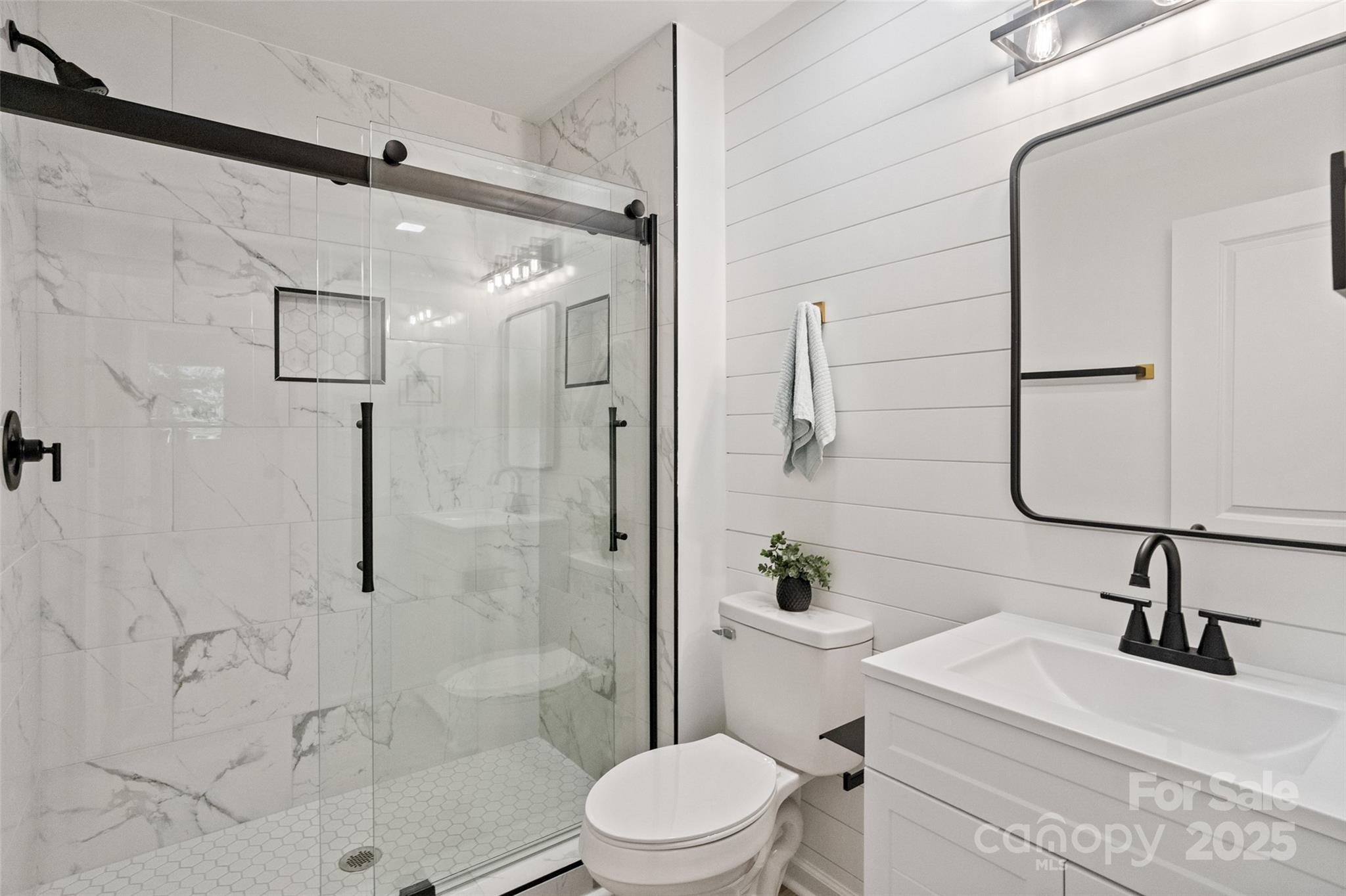 9514 Fairway Ridge Road Charlotte, NC 28277 - Photo 21 of 36 a bathroom with a sink toilet and shower