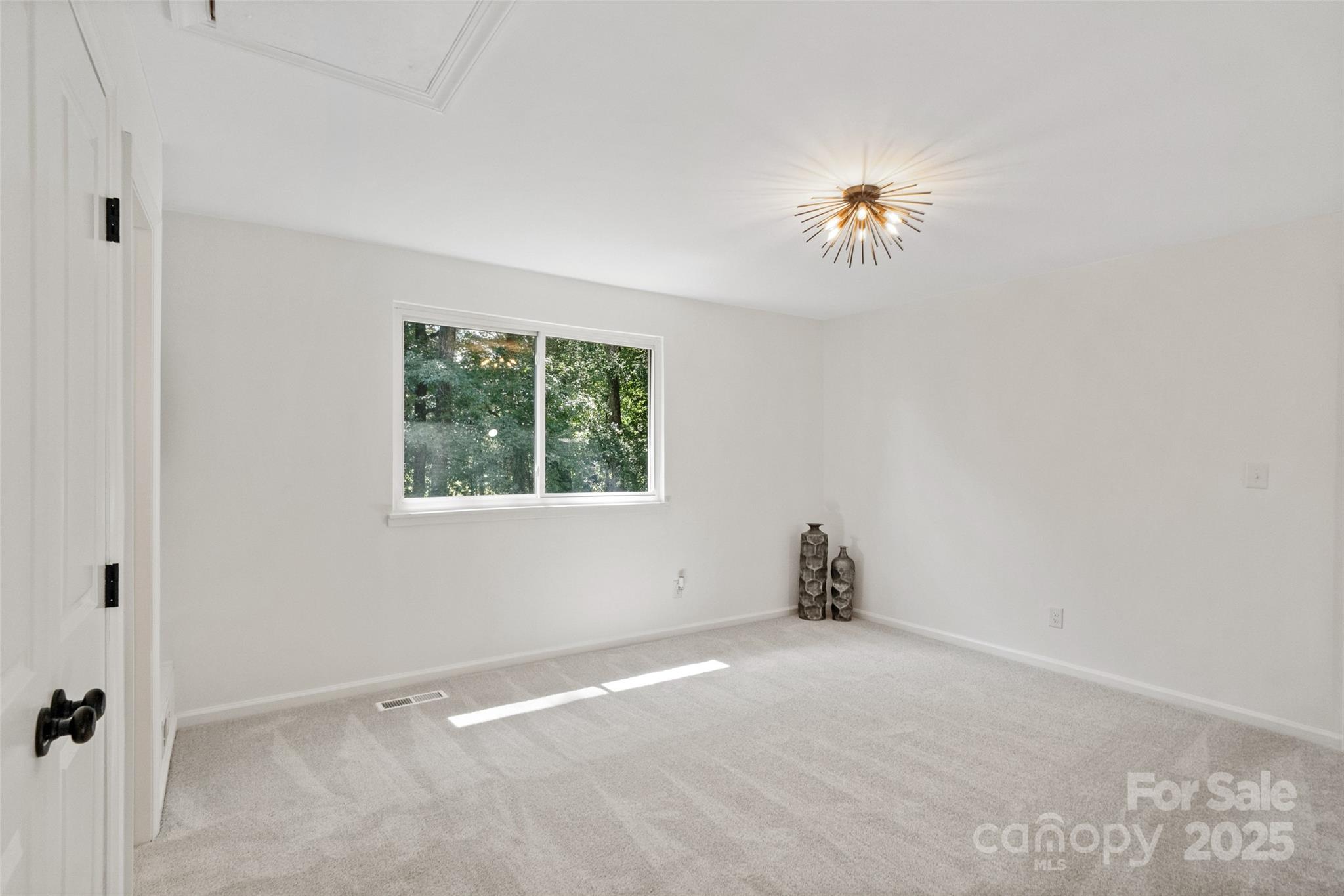 9514 Fairway Ridge Road Charlotte, NC 28277 - Photo 22 of 36 an empty room with a window