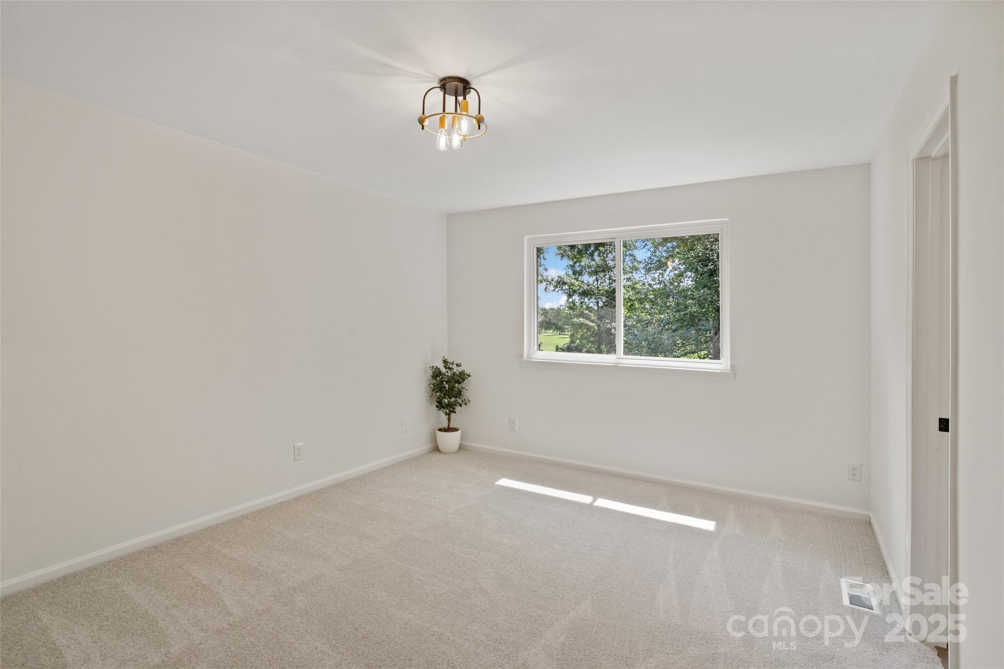 9514 Fairway Ridge Road Charlotte, NC 28277 - Photo 26 of 36 an empty room with windows