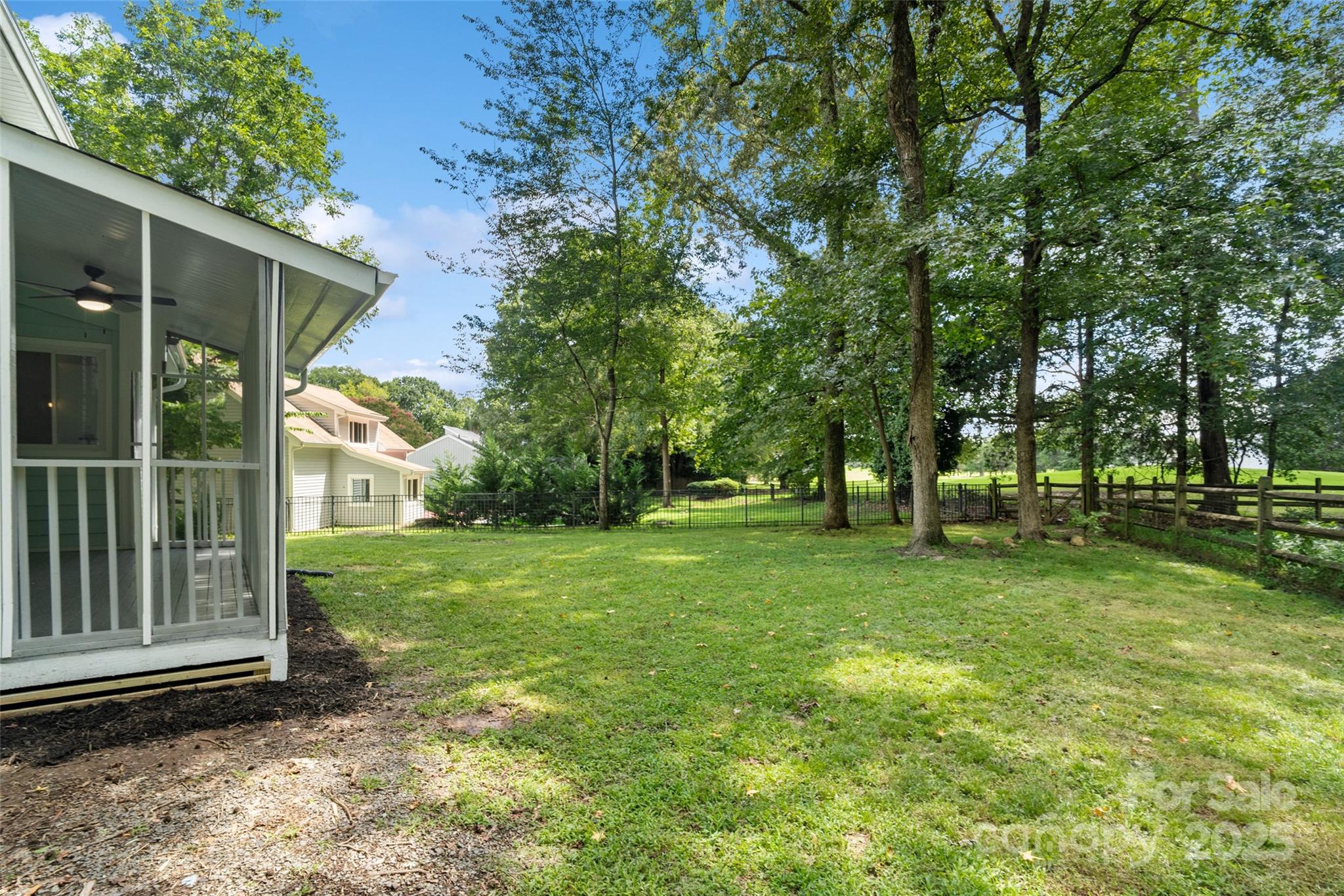 9514 Fairway Ridge Road Charlotte, NC 28277 - Photo 30 of 36 a view of a backyard with large trees