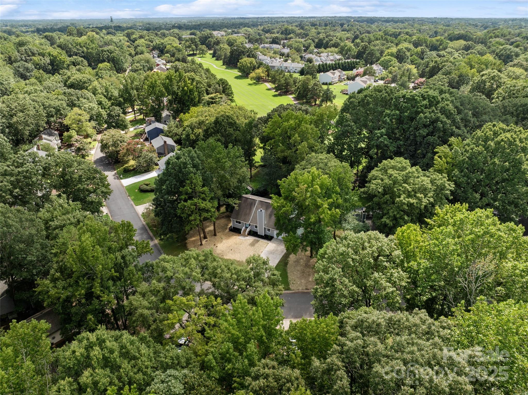 9514 Fairway Ridge Road Charlotte, NC 28277 - Photo 3 of 36 an aerial view of residential house with outdoor space and trees all around