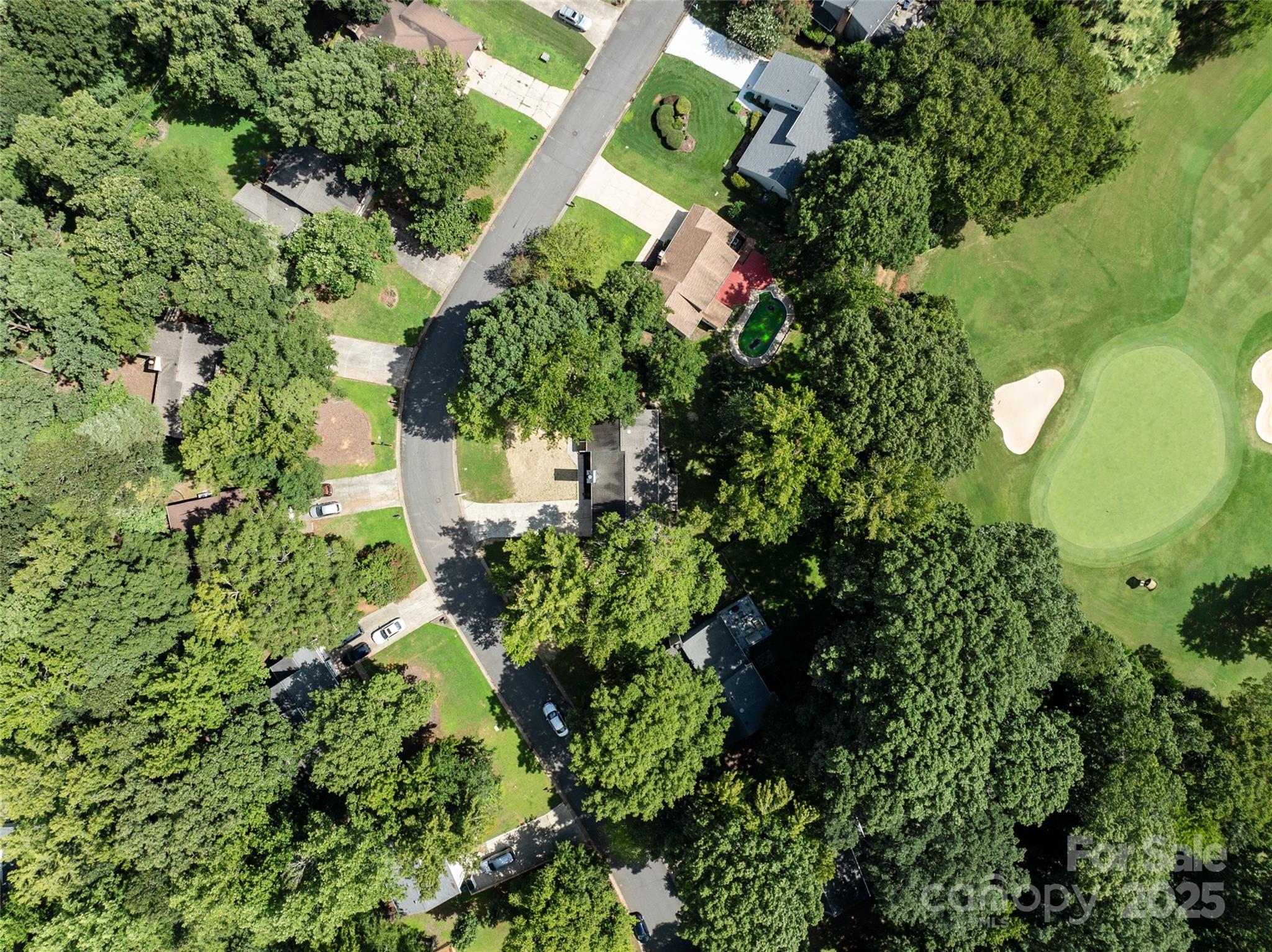 9514 Fairway Ridge Road Charlotte, NC 28277 - Photo 33 of 36 an aerial view of a house with a yard and garden