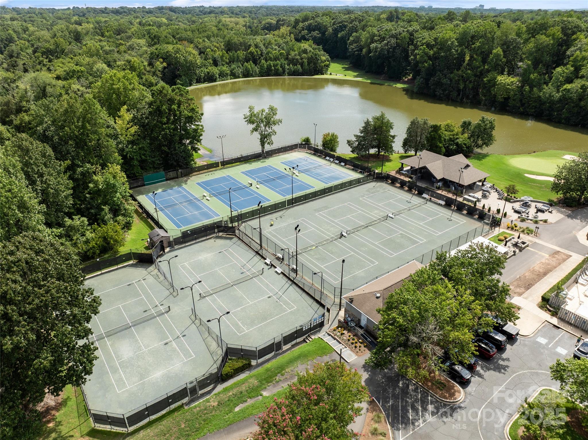 9514 Fairway Ridge Road Charlotte, NC 28277 - Photo 35 of 36 an aerial view of a house with outdoor space and a lake view