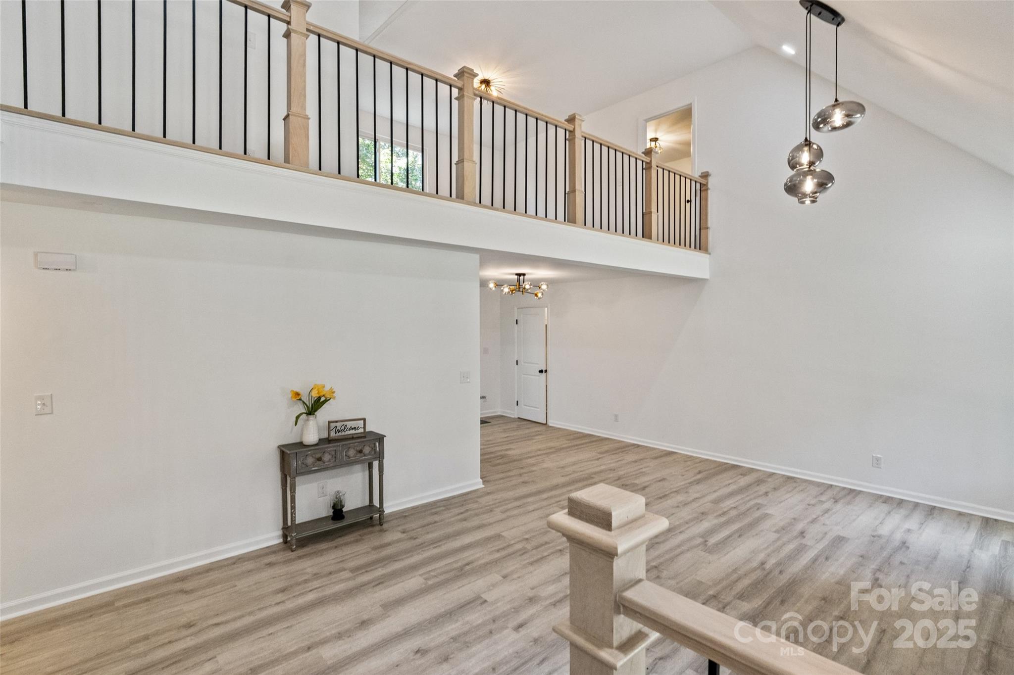 9514 Fairway Ridge Road Charlotte, NC 28277 - Photo 6 of 36 a view of entryway and hall with wooden floor