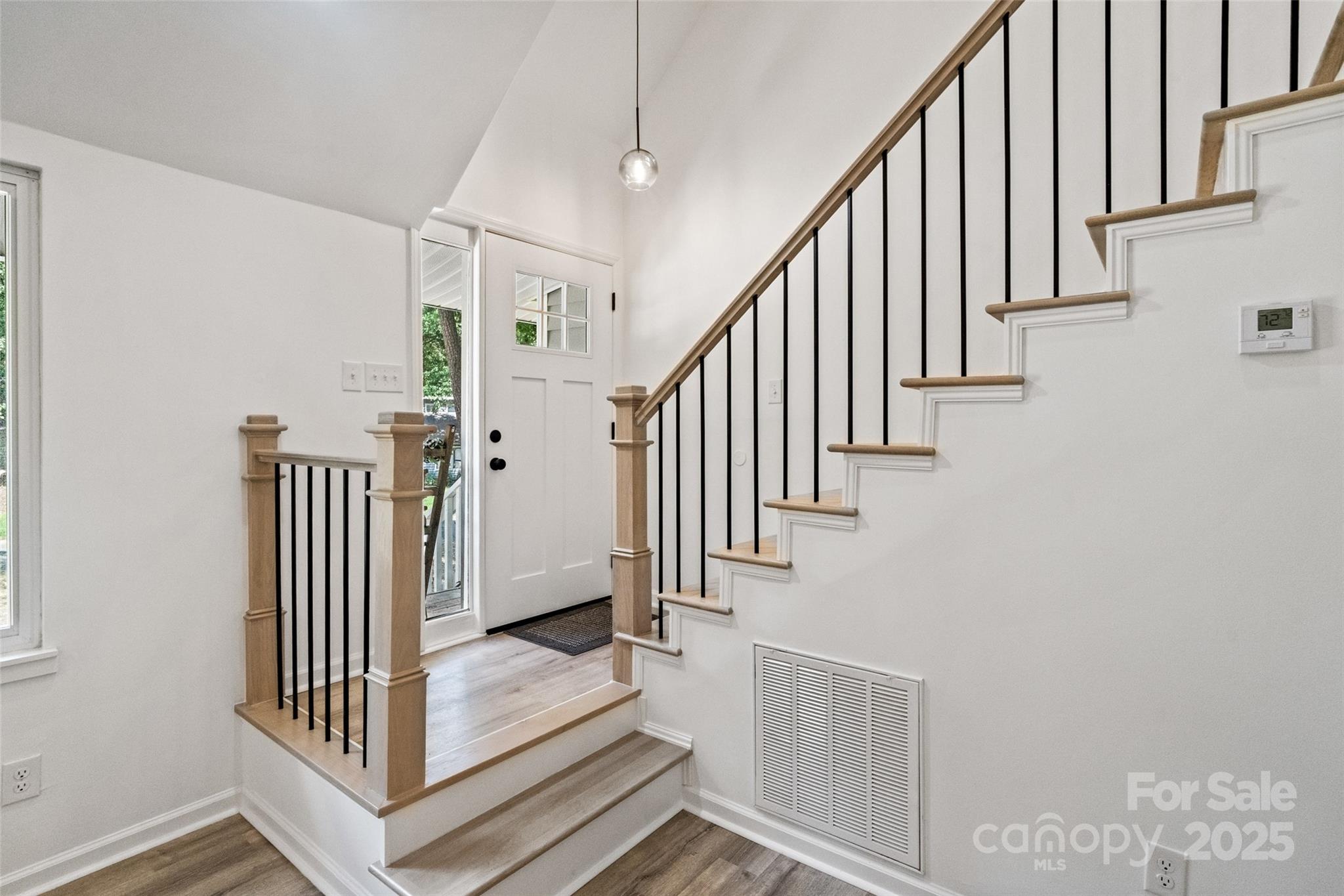 9514 Fairway Ridge Road Charlotte, NC 28277 - Photo 7 of 36 a view of staircase with railing and white walls