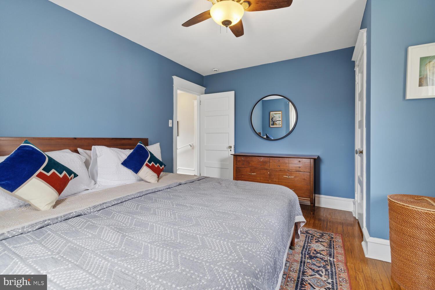 2116 East County Line Road Ardmore, PA 19003 - Photo 22 of 38 a bedroom with a bed and window
