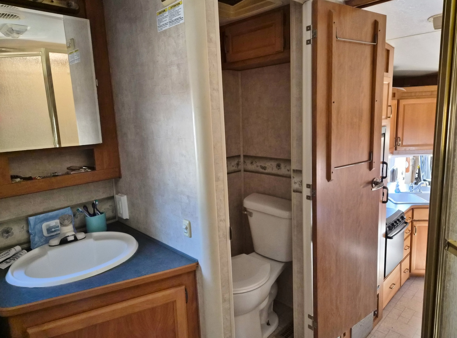 7-197 Woodhaven Lakes Sublette, IL 61367 - Photo 4 of 11 a bathroom with a granite countertop sink toilet and shower