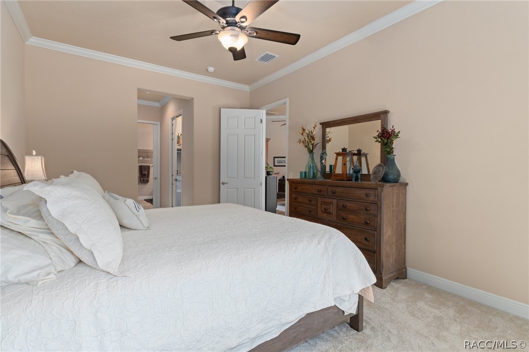 2015 North Rhodes Point Hernando, FL 34442 - Photo 20 of 82 The view across the Primary bedroom from the Bay Window. The opening left of center leads to 2 Primary Closets and the Primary Bath.