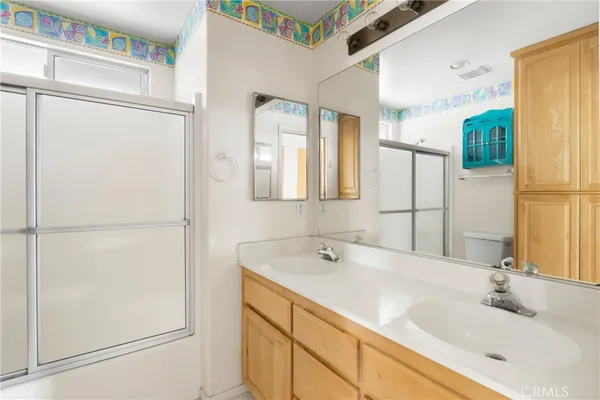 a bathroom with a tub and a sink