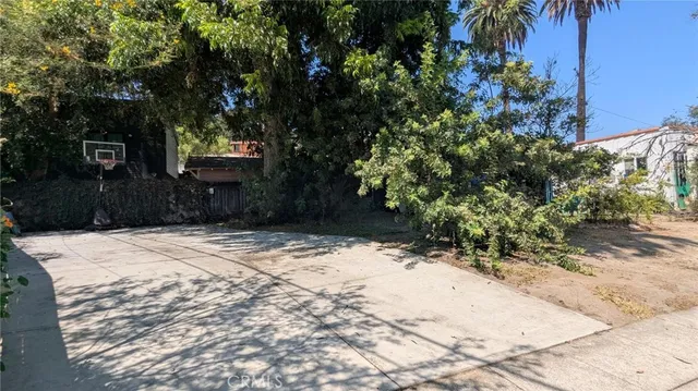 a view of a backyard of a house