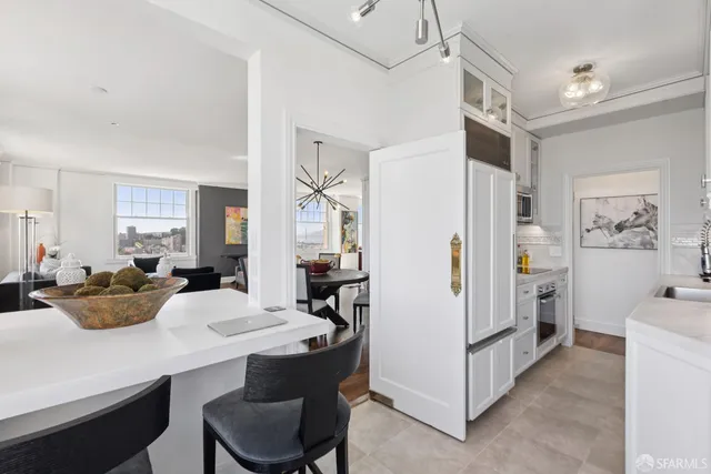 a kitchen with a stove and a microwave