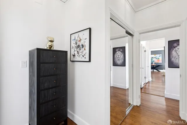 a bedroom with bed and a couch