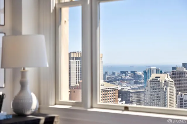 a bathroom with double vanity sink and a mirror
