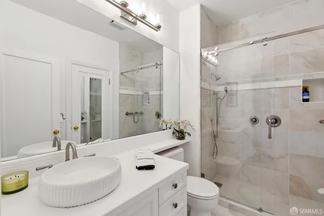 a view of a city with tall buildings in ocean