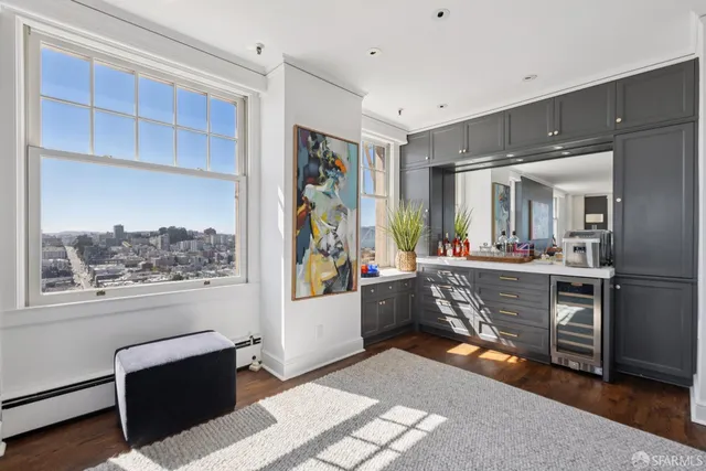 a very nice looking living room with a large window