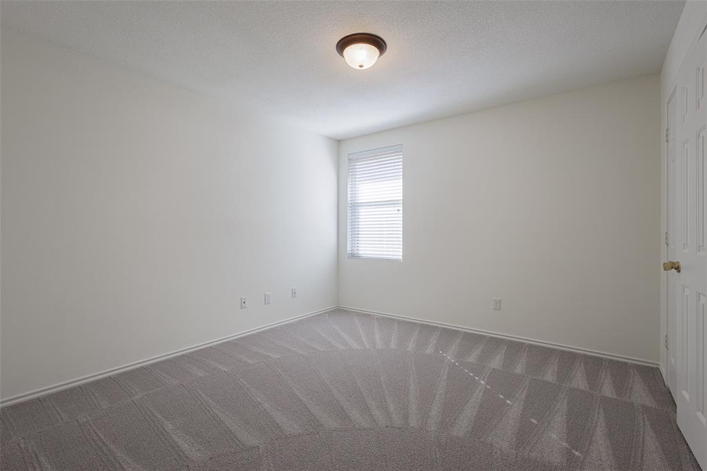 3901 Kathryn Way McKinney, TX 75070 - Photo 19 of 26 an empty room with a window