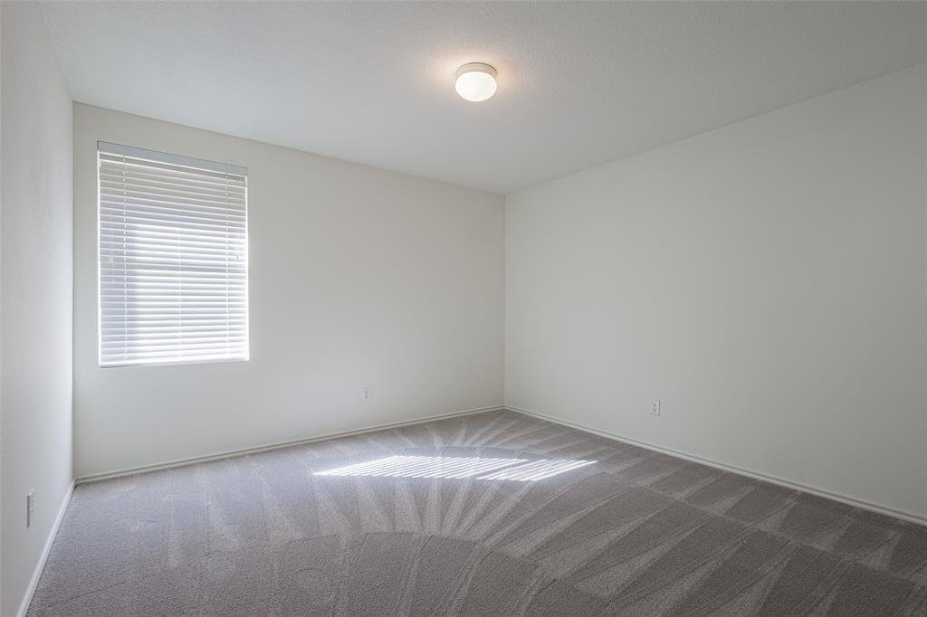 3901 Kathryn Way McKinney, TX 75070 - Photo 20 of 26 an empty room with a window