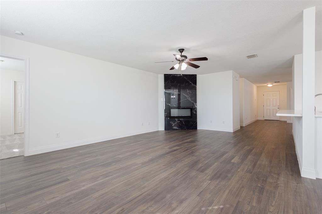 3901 Kathryn Way McKinney, TX 75070 - Photo 10 of 26 a view of empty room with wooden floor