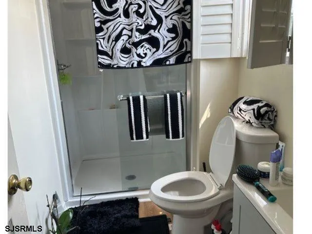 a kitchen with a sink cabinets and a stove