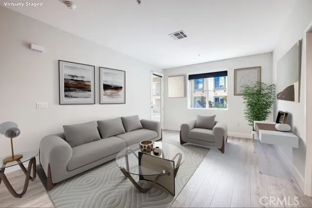a living room with furniture and a couch