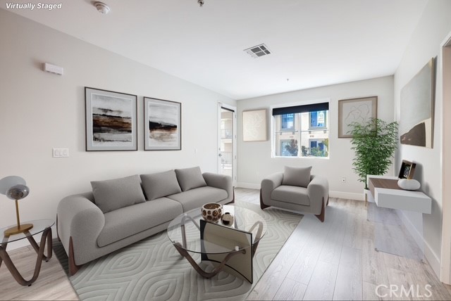 a living room with furniture and a couch
