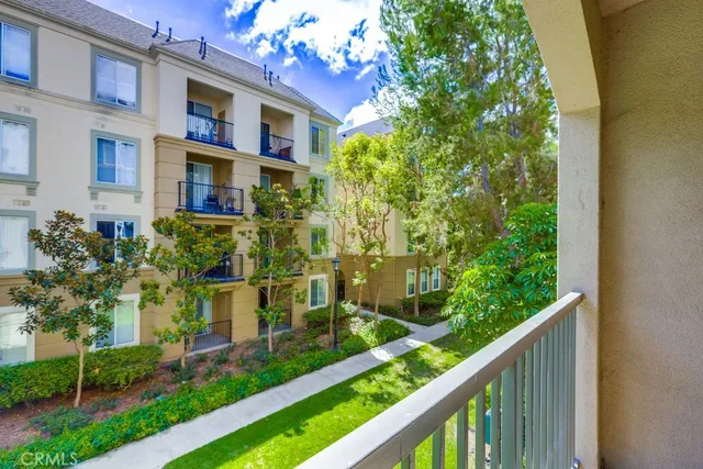a view of a brick house with a large windows