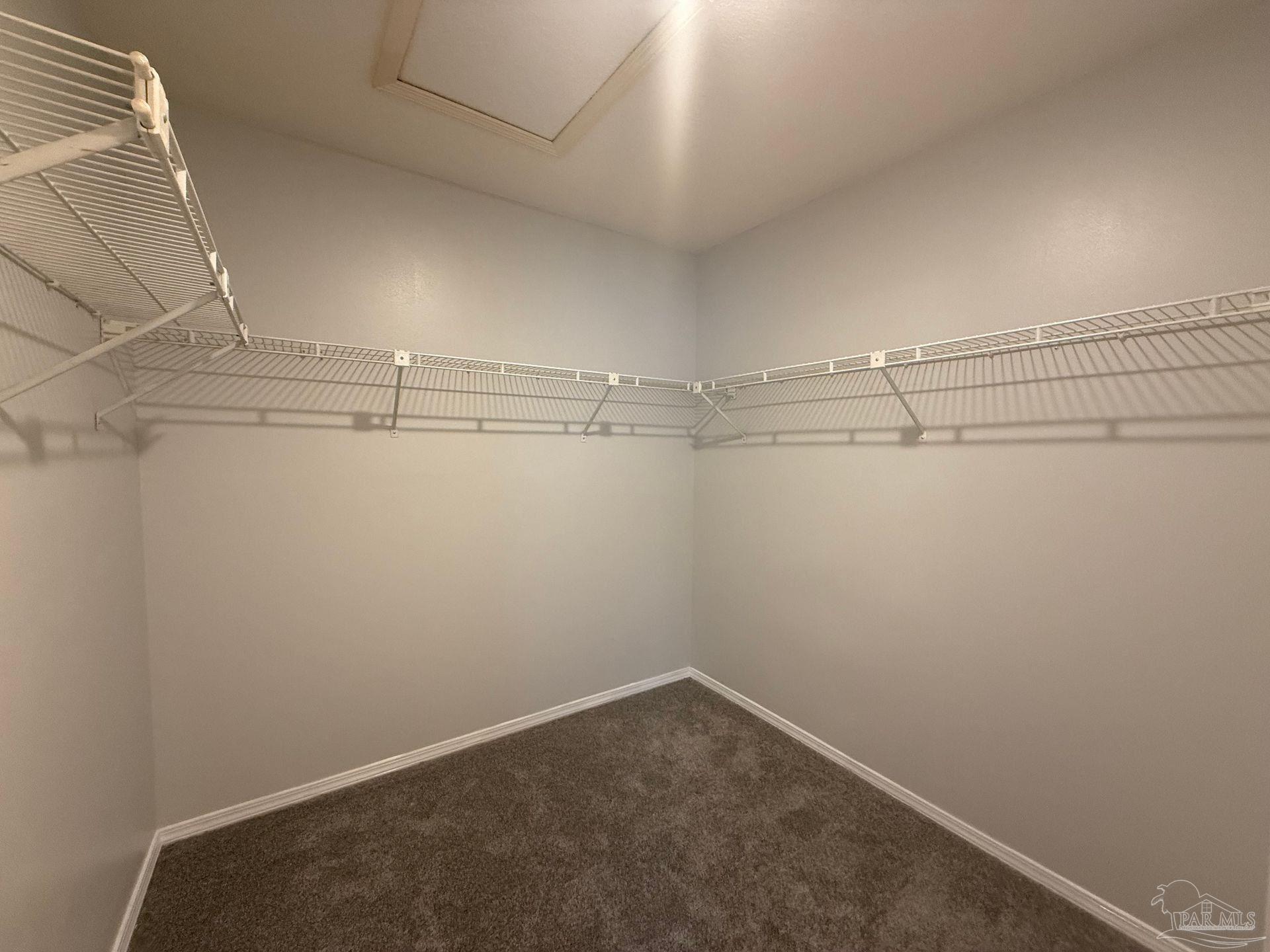 2715 Summertree Lane Gulf Breeze, FL 32563 - Photo 22 of 25 a view of a room with racks on the wall