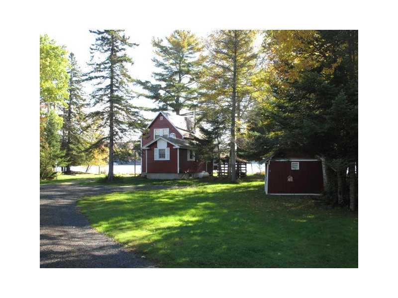 58 Shore Road Rangeley, ME 04970 - Photo 7 of 33 Exterior Back. Camp is at the end of...
