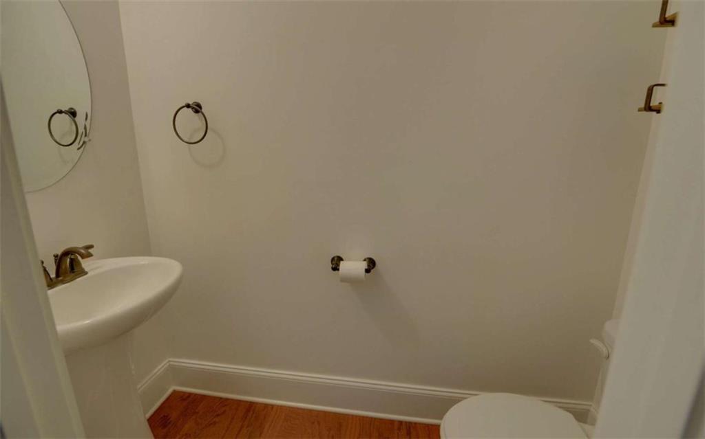 255 Abbington Way Clarkesville, GA 30523 - Photo 17 of 49 a bathroom with a sink a toilet and shower