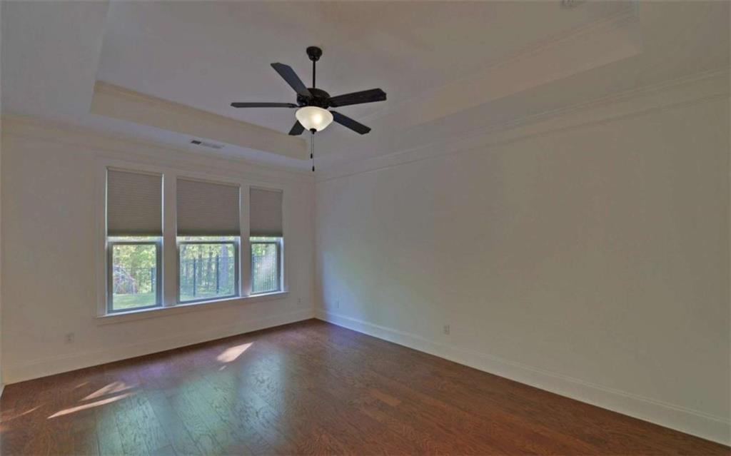 255 Abbington Way Clarkesville, GA 30523 - Photo 20 of 49 an empty room with a window and a fan