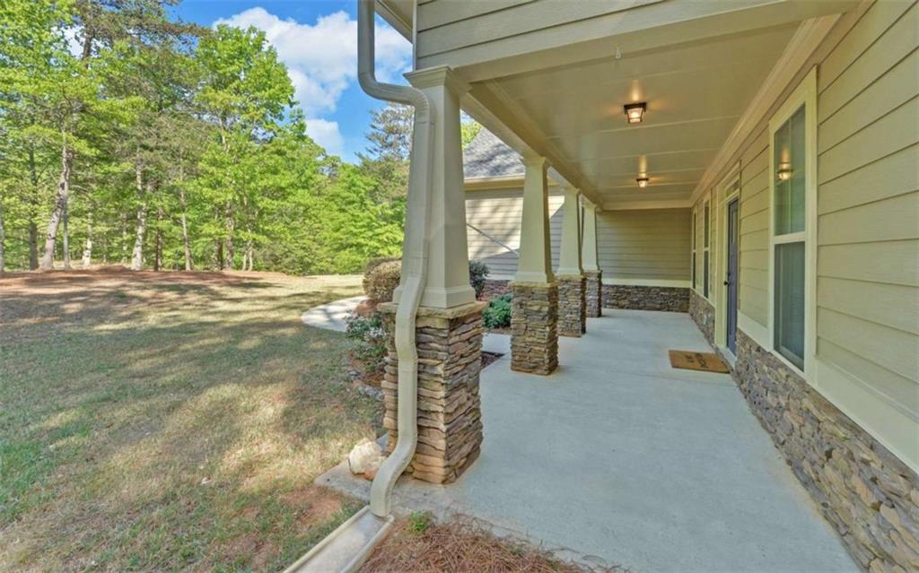 255 Abbington Way Clarkesville, GA 30523 - Photo 2 of 49 a view of a porch with seating space