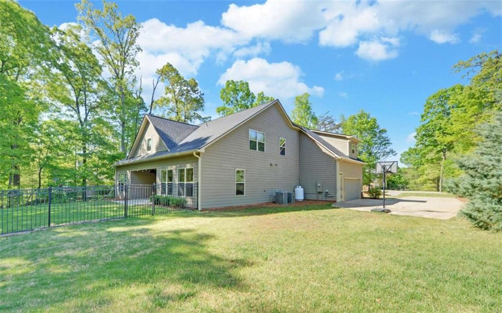 255 Abbington Way Clarkesville, GA 30523 - Photo 47 of 49 a front view of house with yard and green space