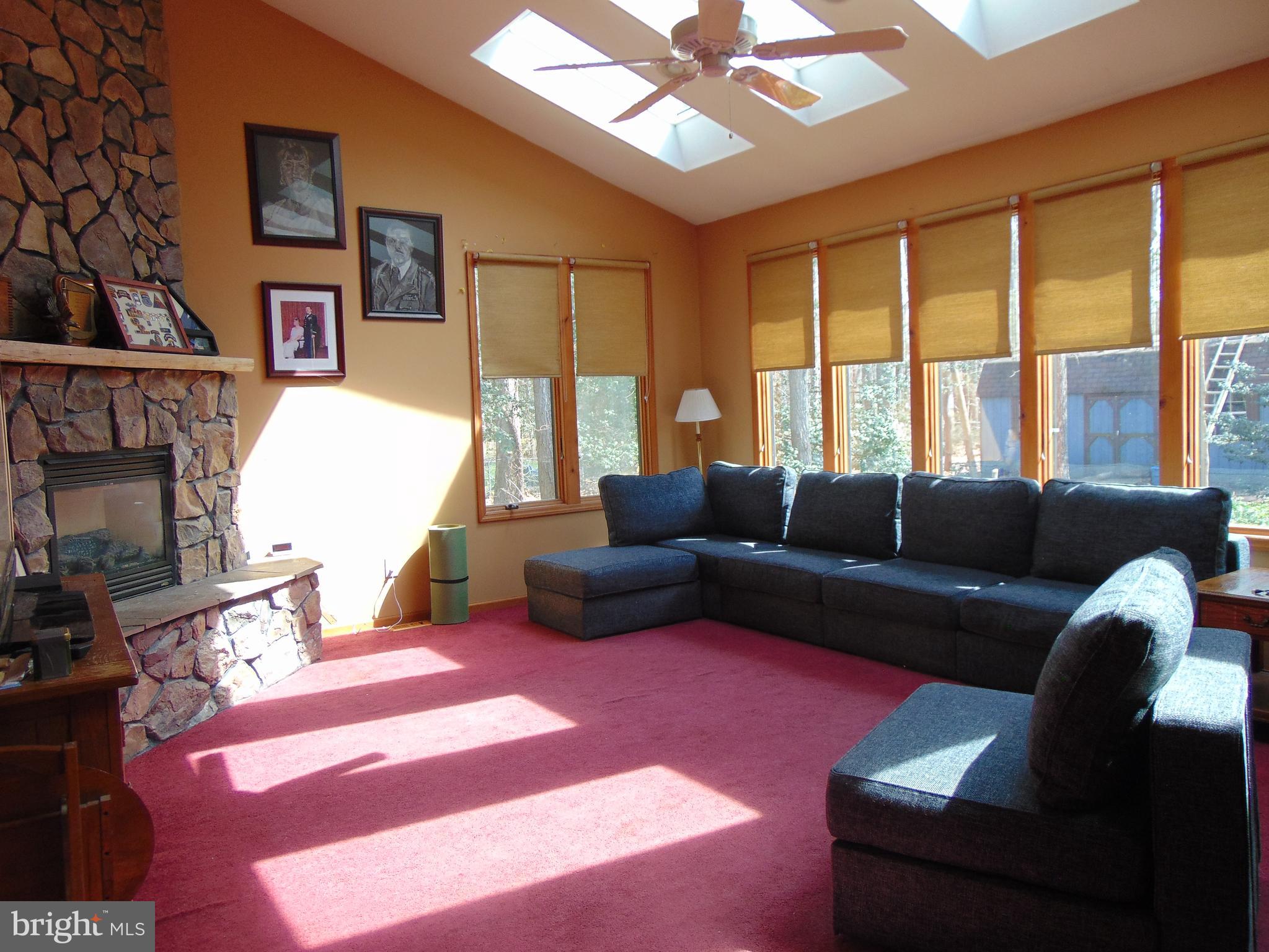 12 Mallard Drive Tabernacle, NJ 08088 - Photo 12 of 31 a living room with furniture a large window and a fireplace