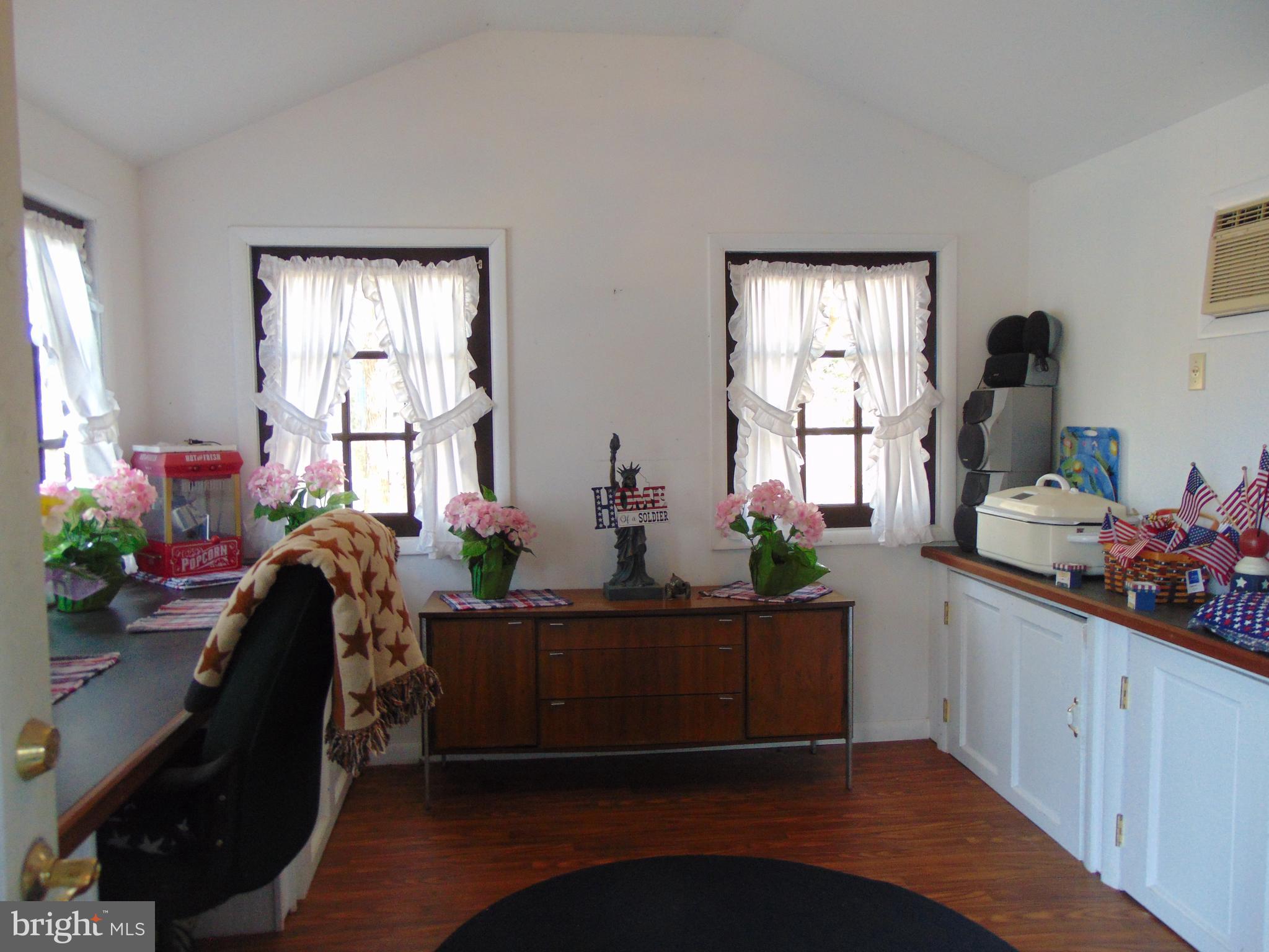 12 Mallard Drive Tabernacle, NJ 08088 - Photo 21 of 31 a living room with furniture and flowers