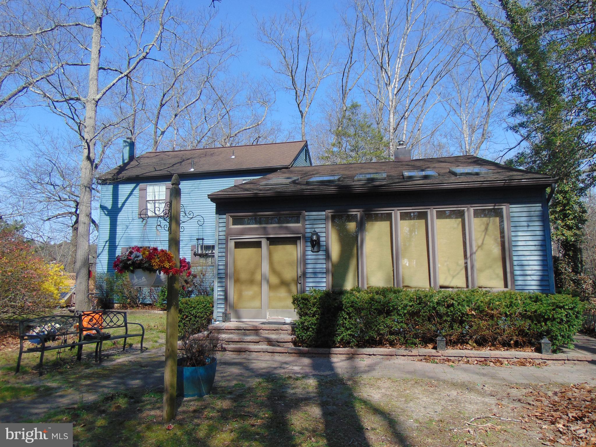 12 Mallard Drive Tabernacle, NJ 08088 - Photo 31 of 31 a view of a house with potted plants and a bench