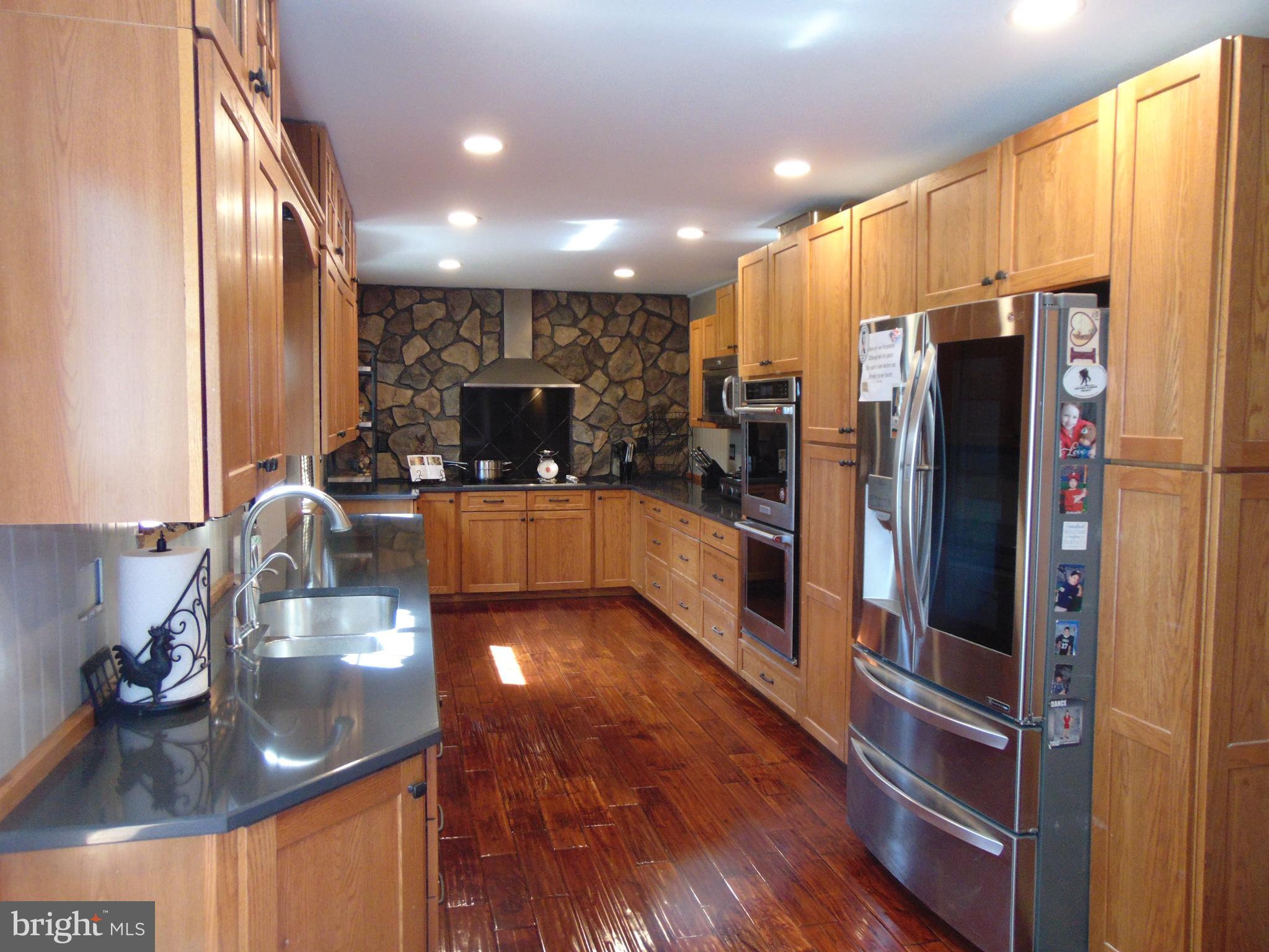 12 Mallard Drive Tabernacle, NJ 08088 - Photo 4 of 31 a kitchen with stainless steel appliances granite countertop a refrigerator and a sink