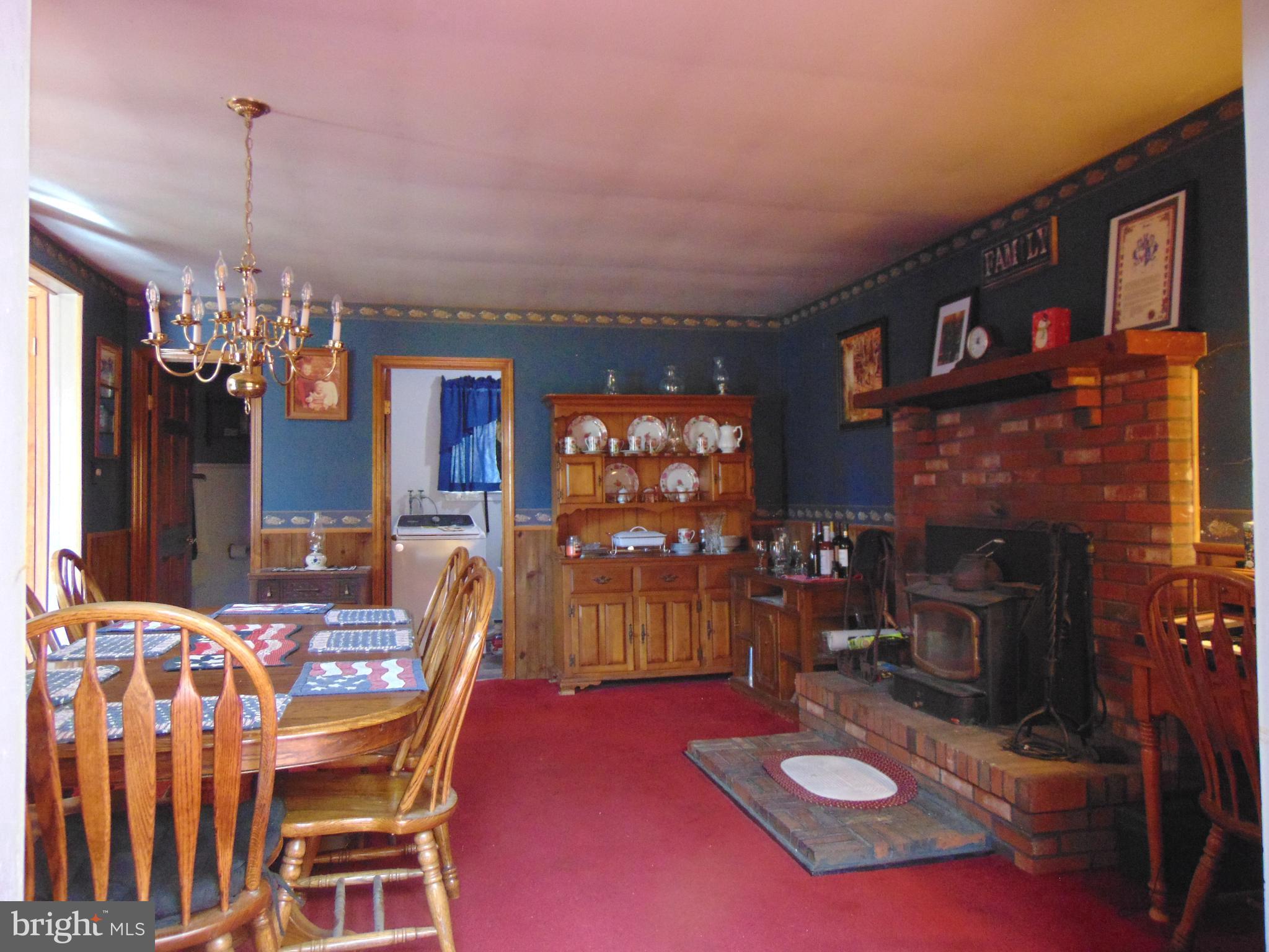12 Mallard Drive Tabernacle, NJ 08088 - Photo 9 of 31 a view of a dining room with furniture and chandelier