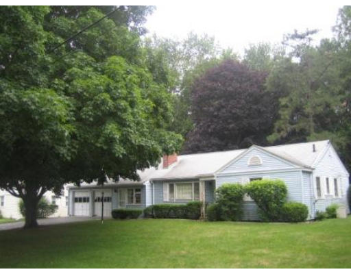 69 Talbot Road Springfield, MA 01119 - Photo 1 of 7 a front view of a house with a yard