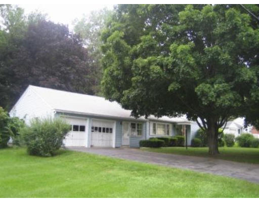 69 Talbot Road Springfield, MA 01119 - Photo 2 of 7 a front view of a house with a garden