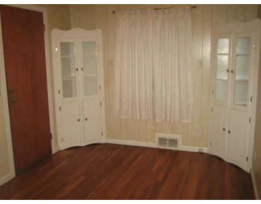 69 Talbot Road Springfield, MA 01119 - Photo 4 of 7 a view of an empty room with wooden floor