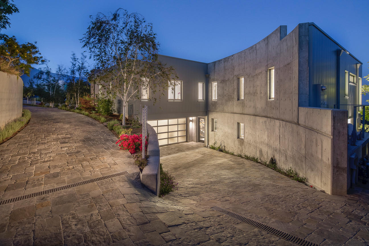 376 Las Alturas Road Santa Barbara, CA 93103 - Photo 29 of 36 a front view of a house with a yard