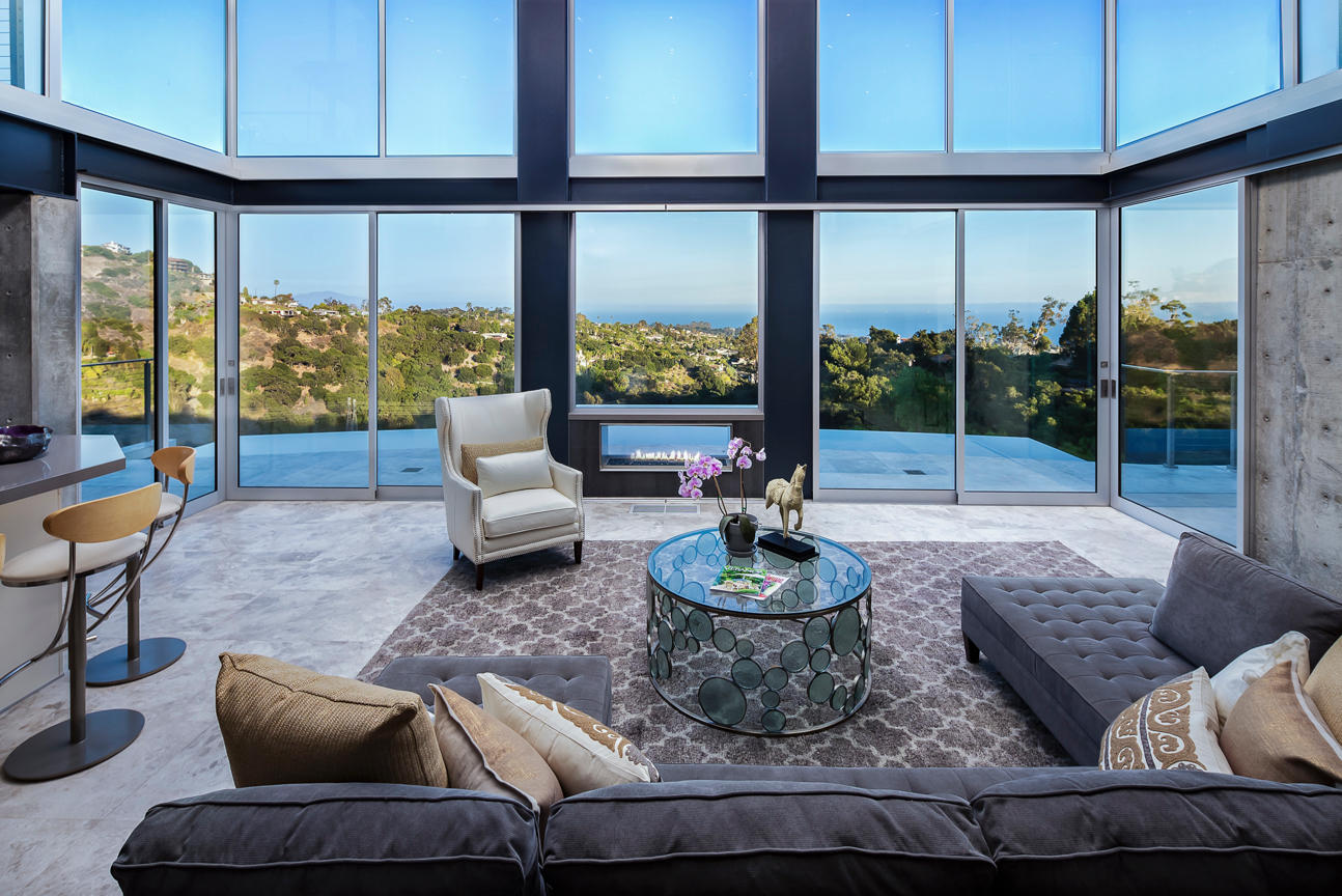 376 Las Alturas Road Santa Barbara, CA 93103 - Photo 9 of 36 a living room with furniture and a floor to ceiling window