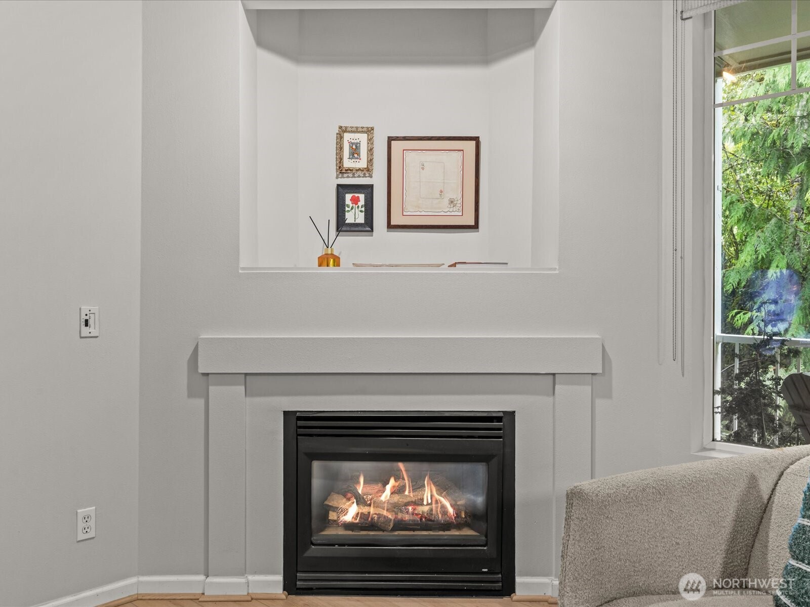 15150 140th Way Southeast, Unit P204 Renton, WA 98058 - Photo 13 of 28 a living room with a fireplace and a view of living room